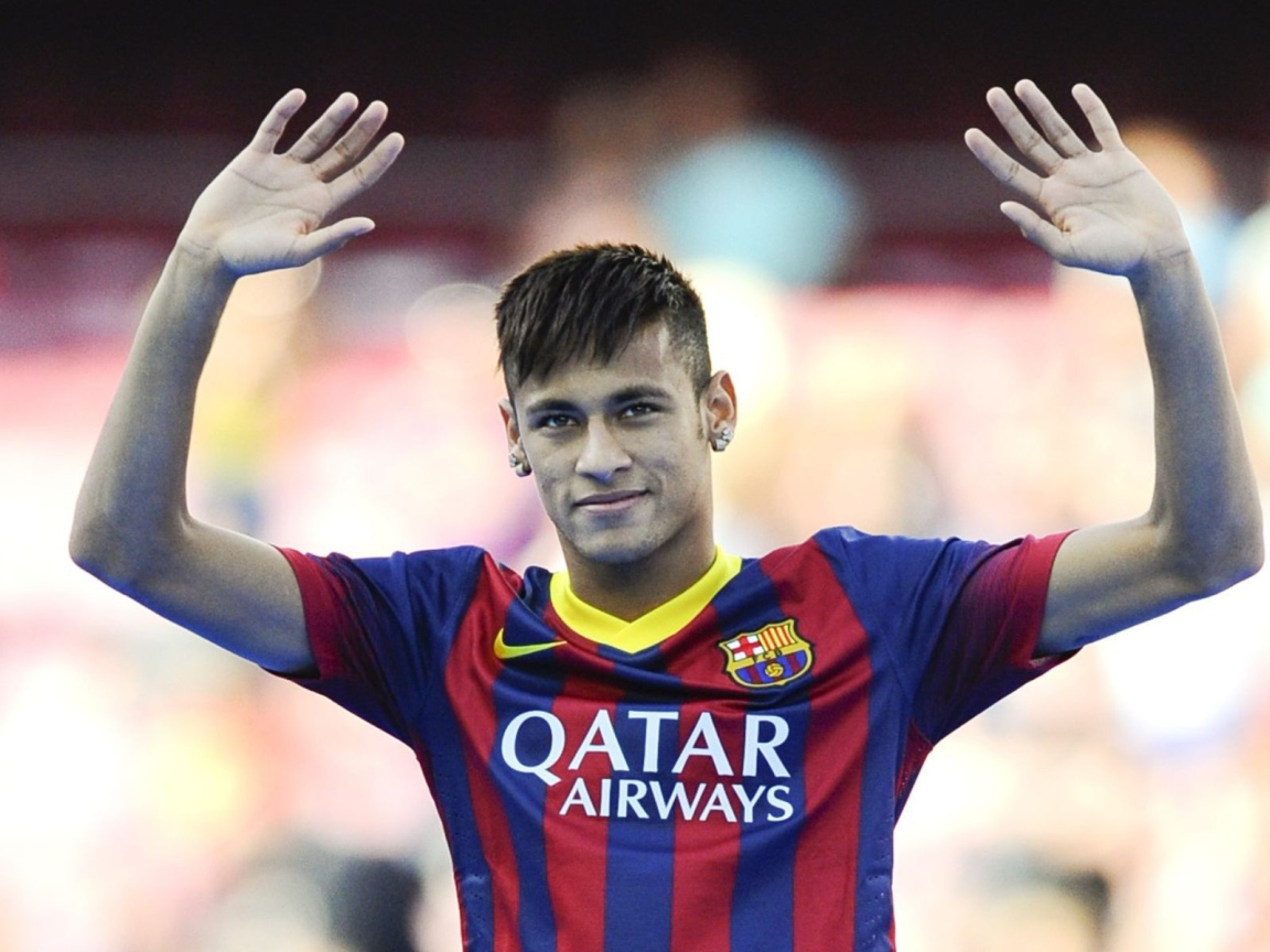 The football player of Barcelona Neymar hand up