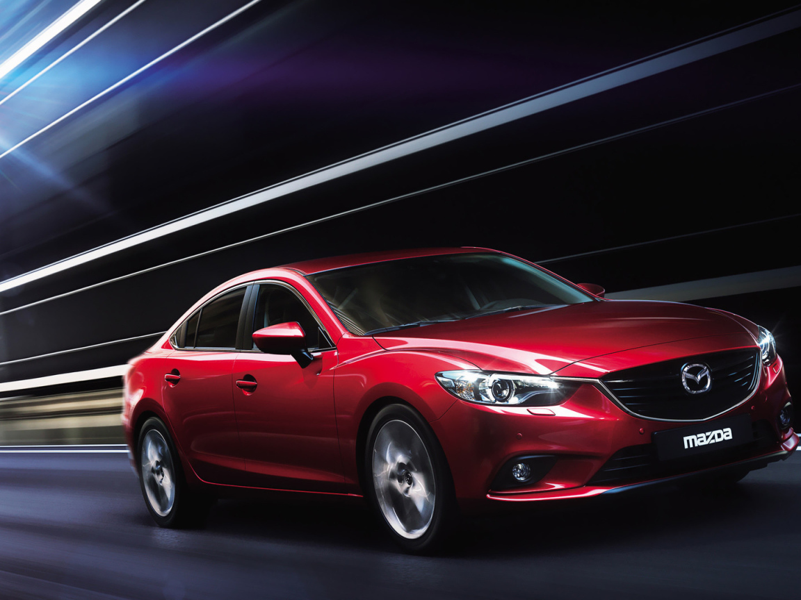 Надежная машина Mazda 3 2014