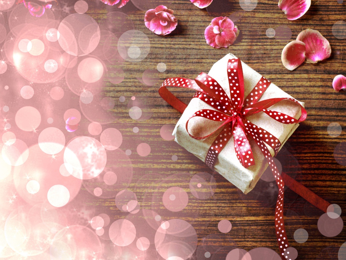 Обвязанный лентой подарок