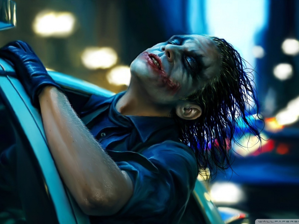 Джокер в полицейском автомобиле