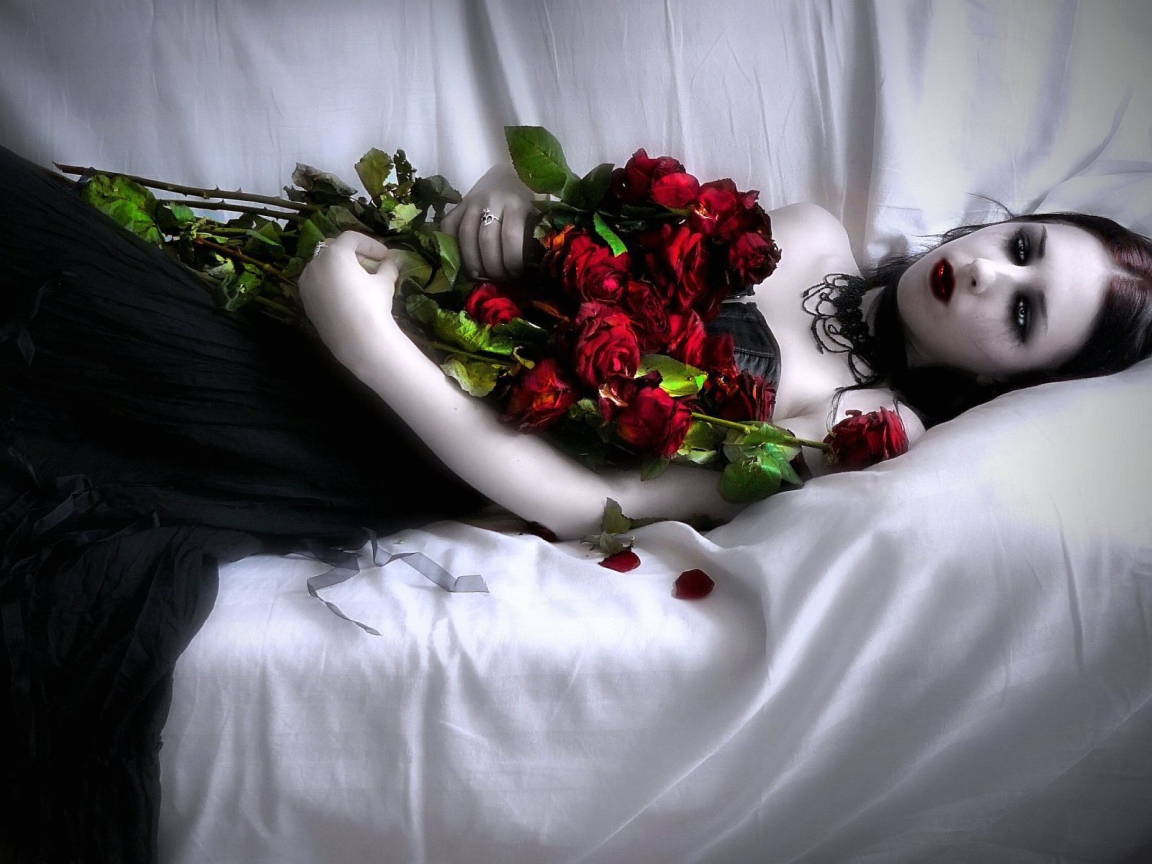 Vampire girl with a bouquet of roses