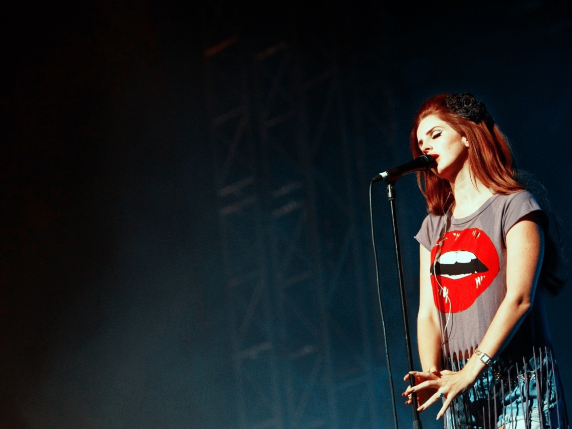 	   Lana Del Rey at the microphone
