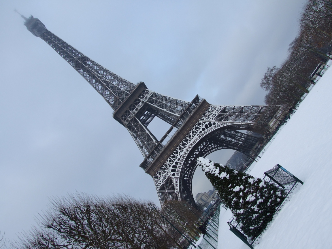 Snow in Paris Eiffel Tower tilted