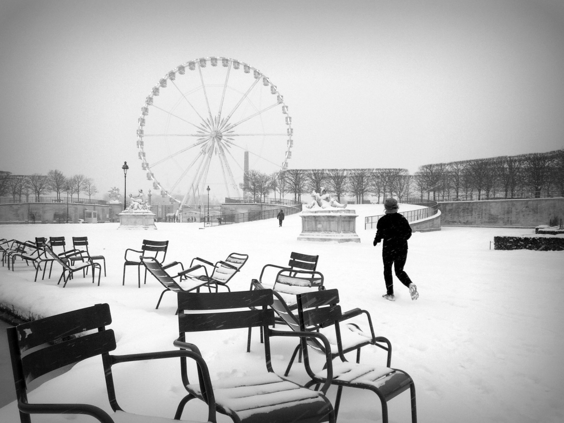 Snow in Paris ferris wheel