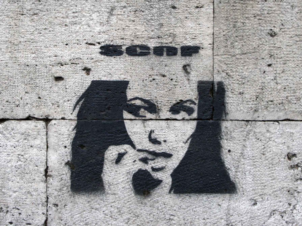 Рисунок девушки на стене