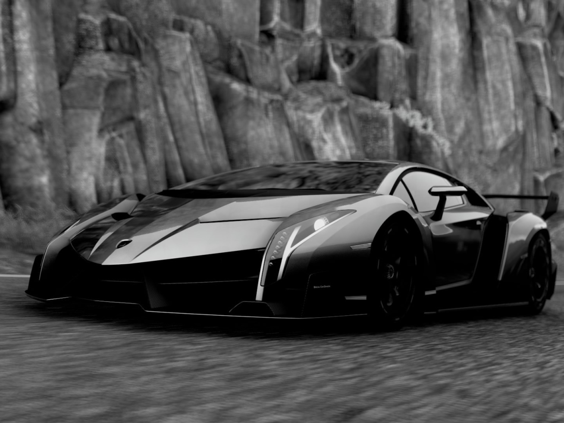 Черный Ламборгини у каменной скалы