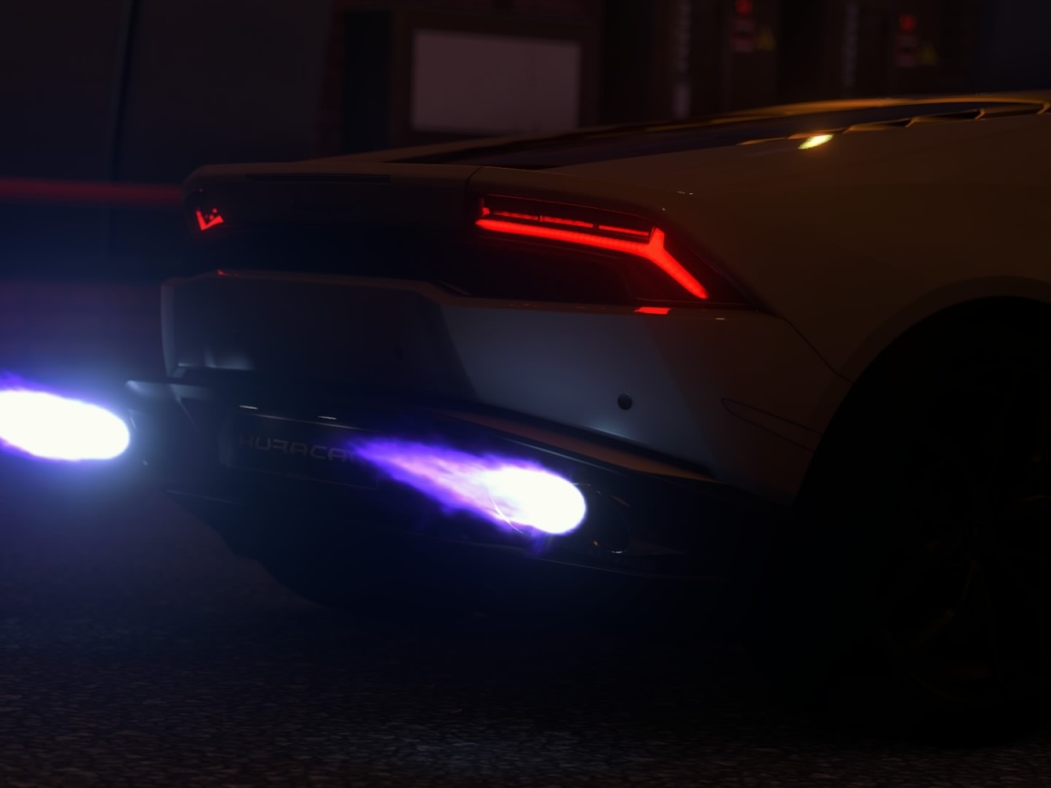 Голубые огоньки выхлопа Ламборгини