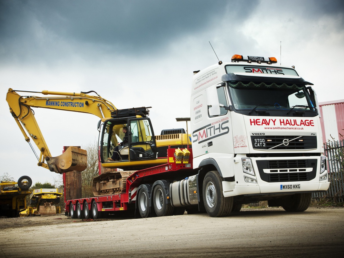 Экскаватор на тягаче