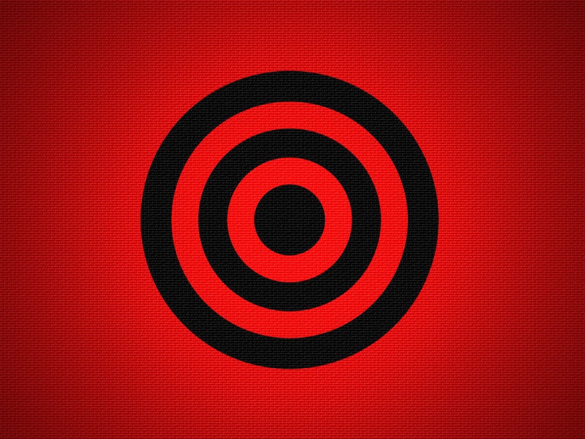 Черная мишень на красном фоне