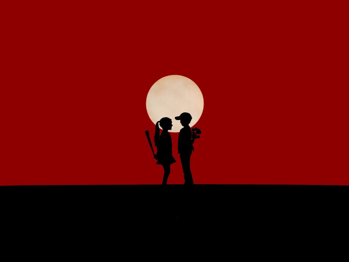 Мальчик и девочка на красном фоне