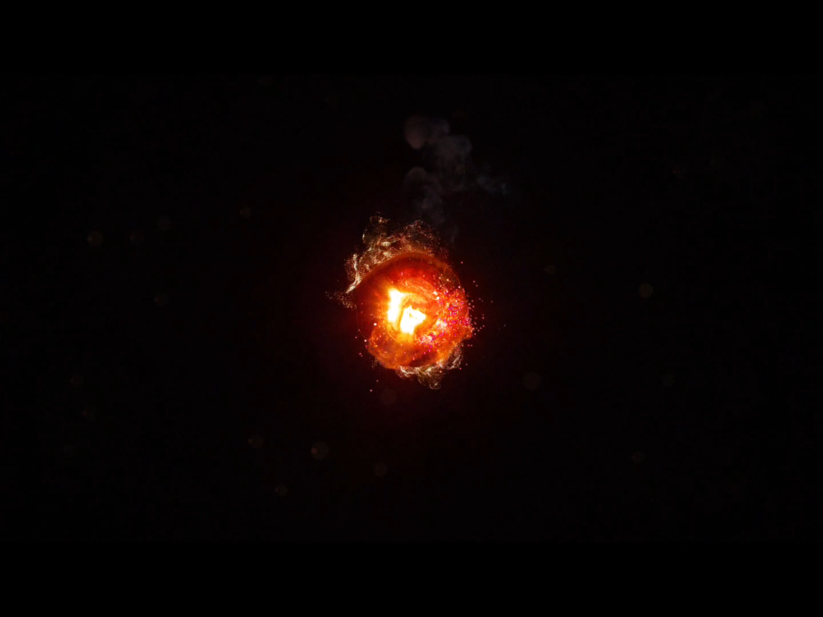 Горящий уголек, черный фон