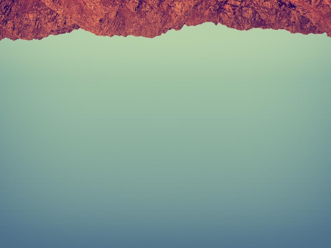 Красный камень на сером фоне