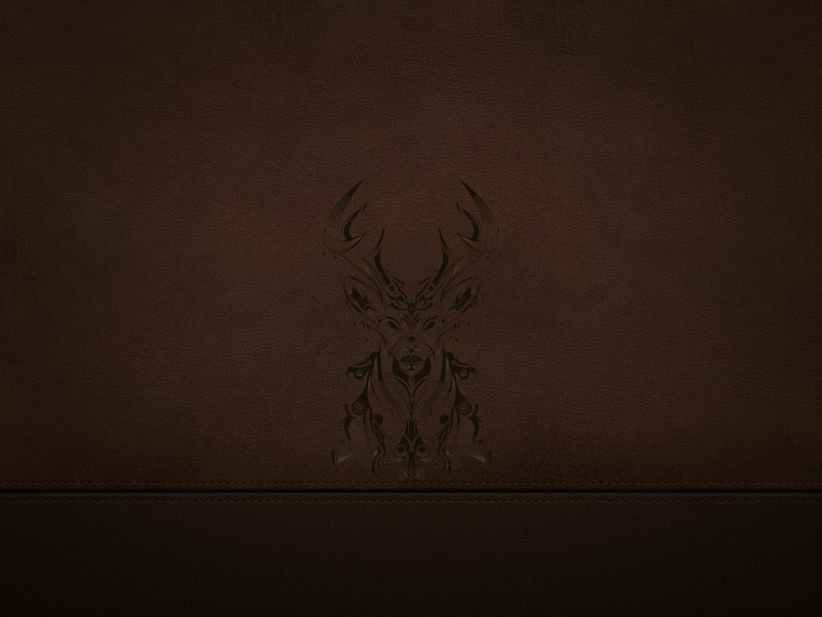 Силуэт оленя на коричневой коже