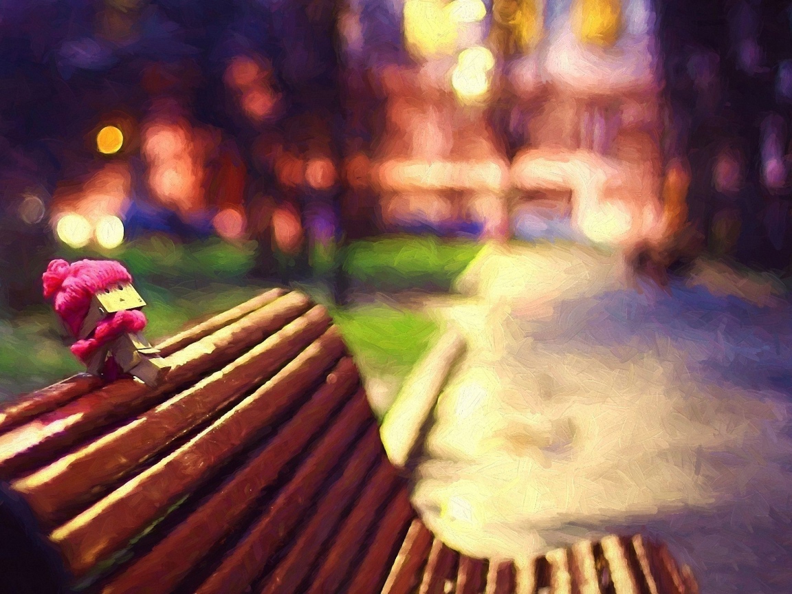 Человечек из картона на скамье