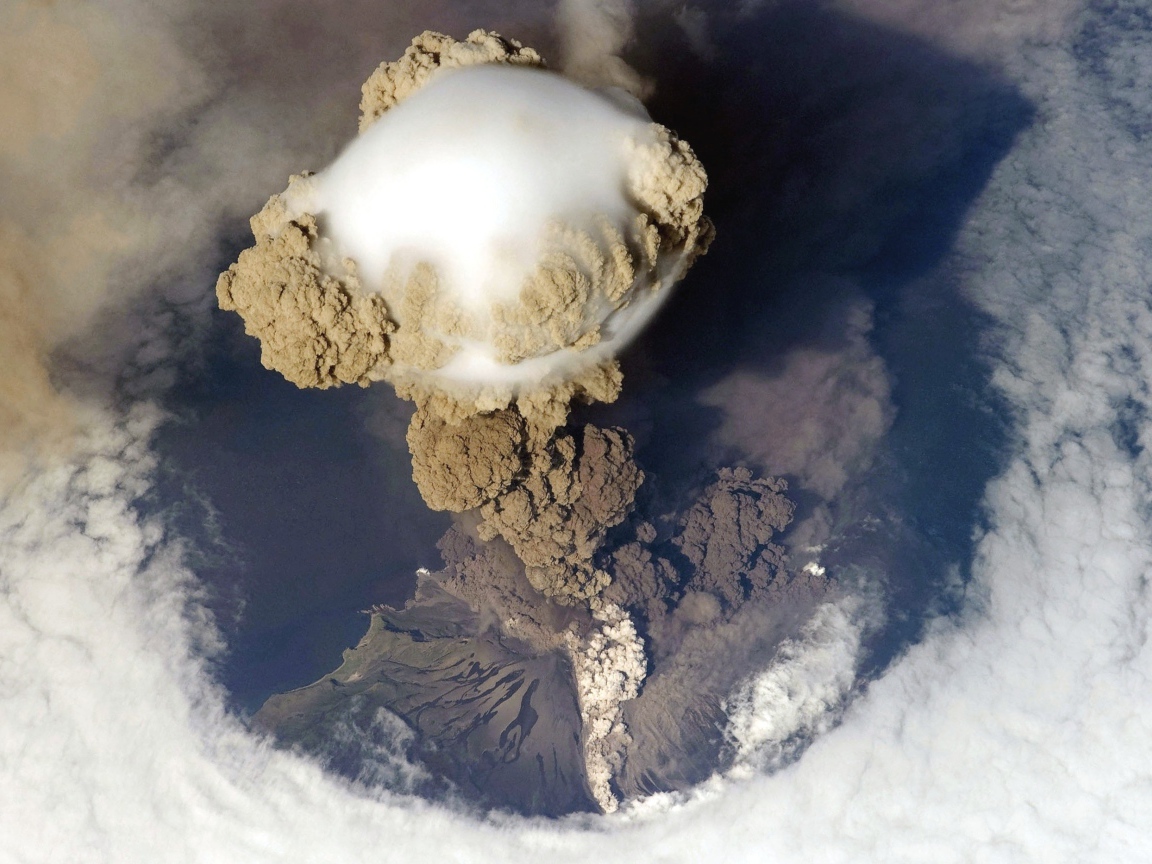 A cloud of smoke over the volcano, photo from space