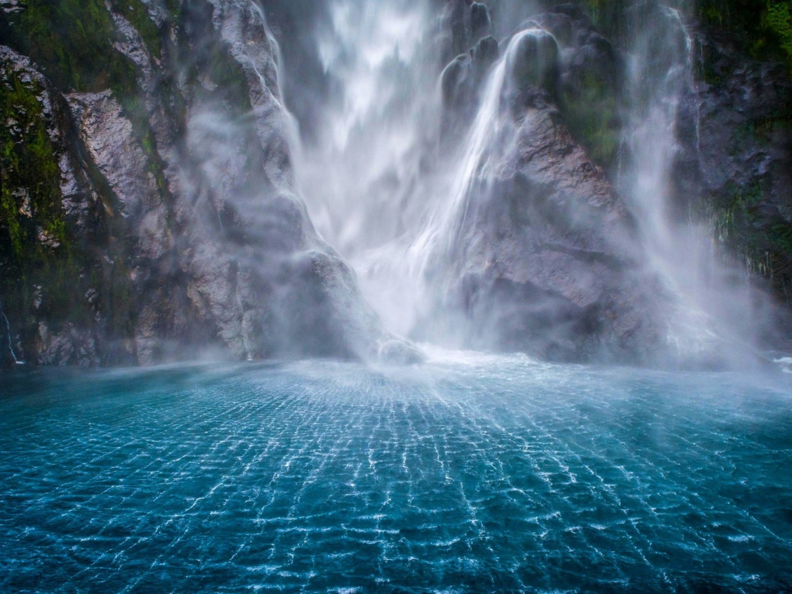 Gorgeous waterfall in Milford Sound, New Zealand