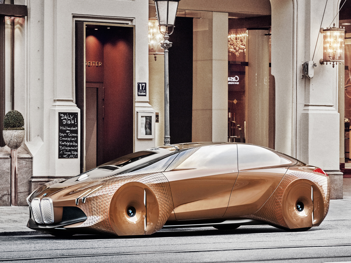 Коричневый стильный автомобиль BMW Concept Vision Next 100