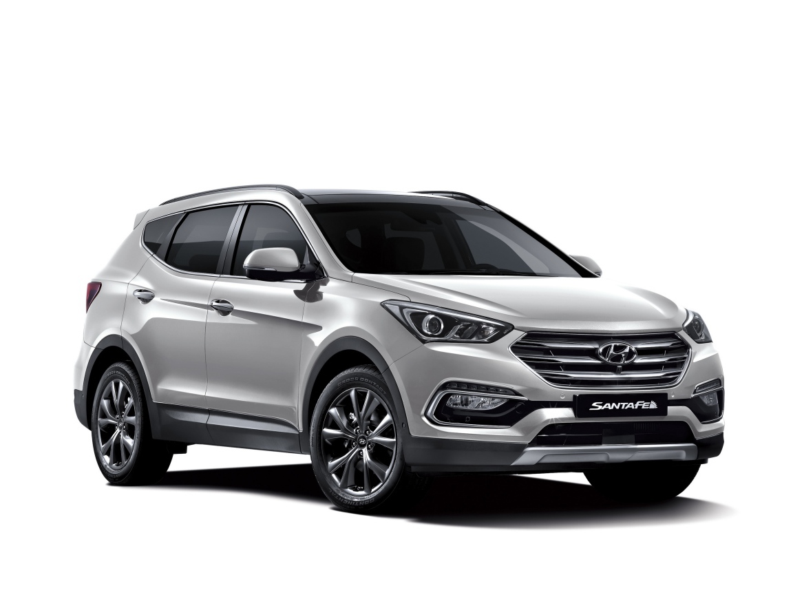 Серебристый автомобиль Hyundai Santa Fe  на белом фоне