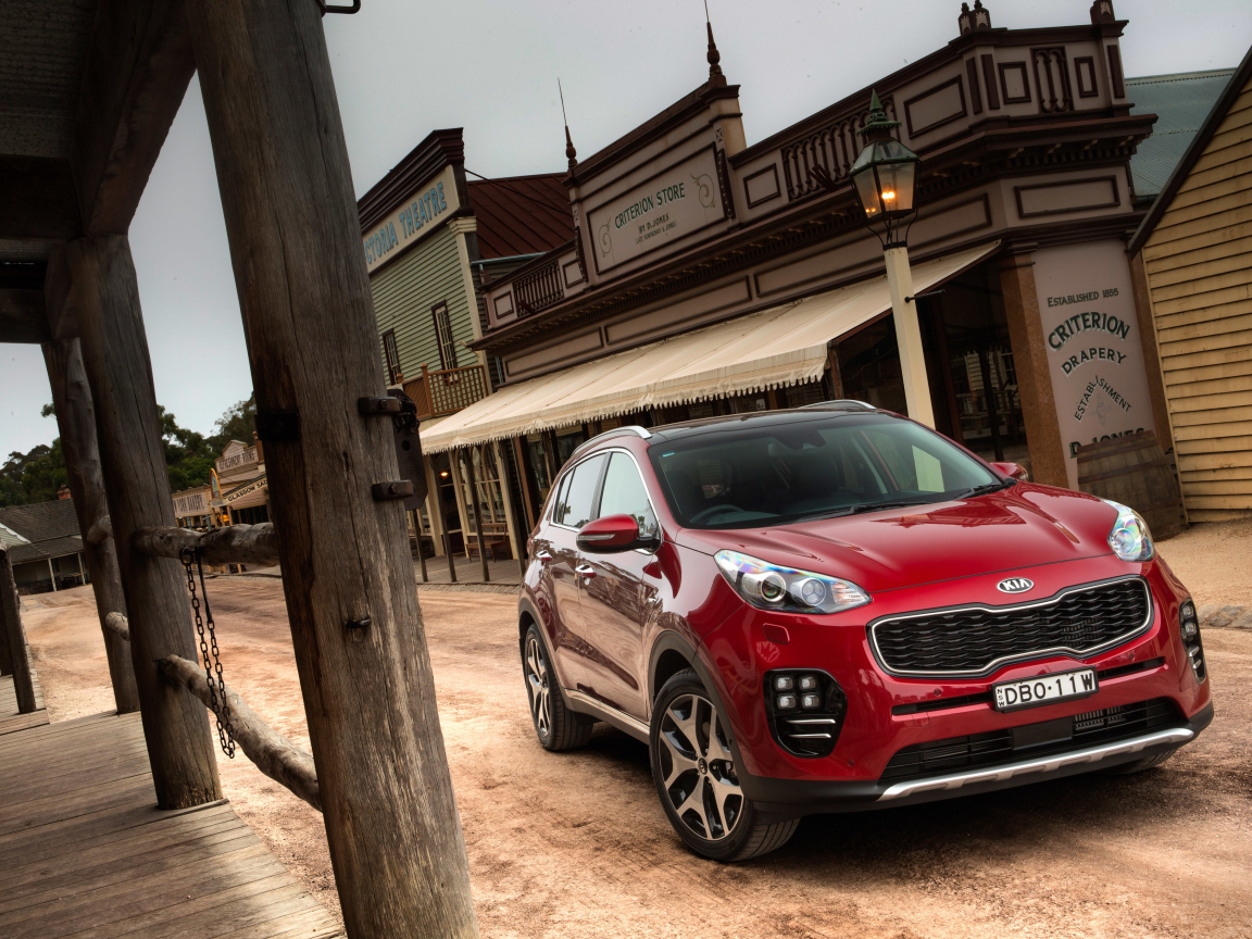 Красный внедорожник  Kia Sportage