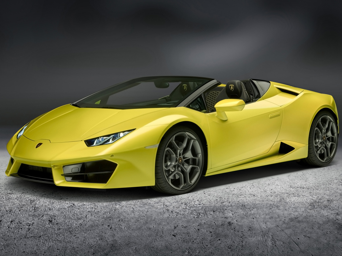 Желтый автомобиль кабриолет Lamborghini Huracan