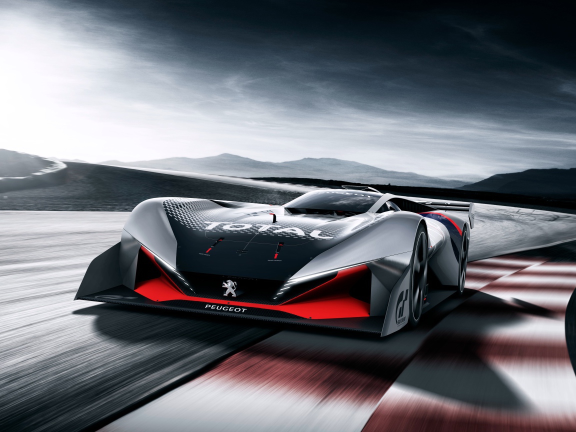 Гоночный автомобиль Peugeot L750 R Hybrid Vision Gran Turismo на трассе