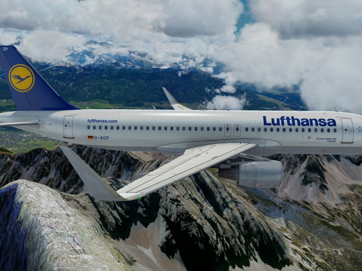 Airbus A320 авиакомпании Lufthansa полет над горами 