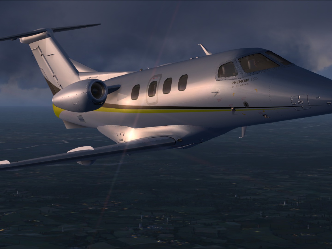 Embraer Phenom 100 в небе 