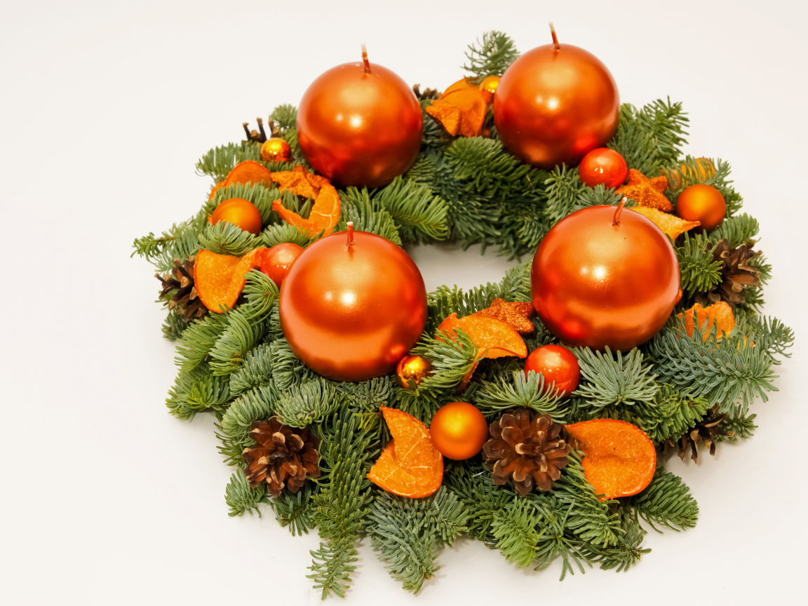 Christmas wreath of fir branches with candles