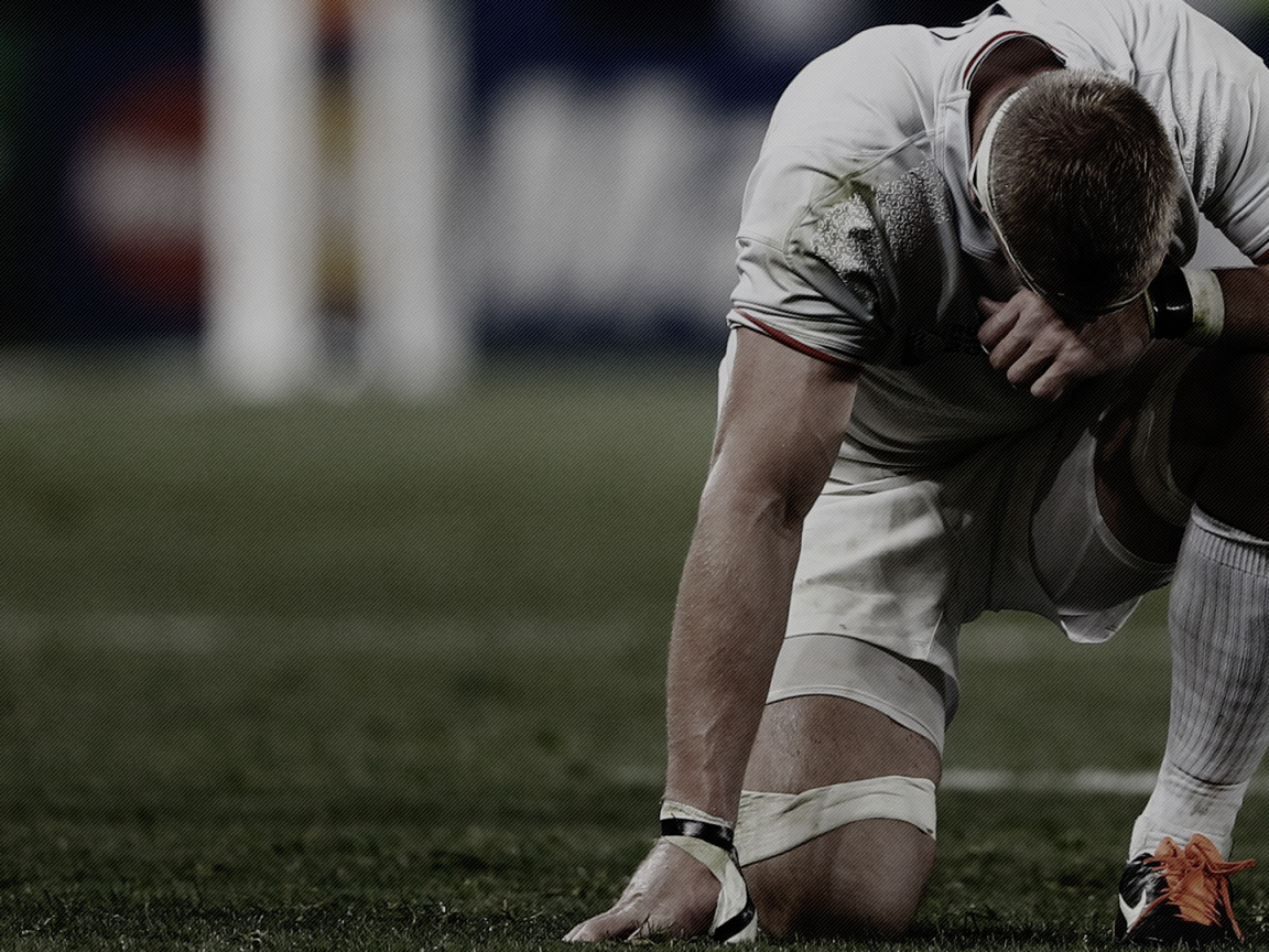 Спортсмен регбист на поле 