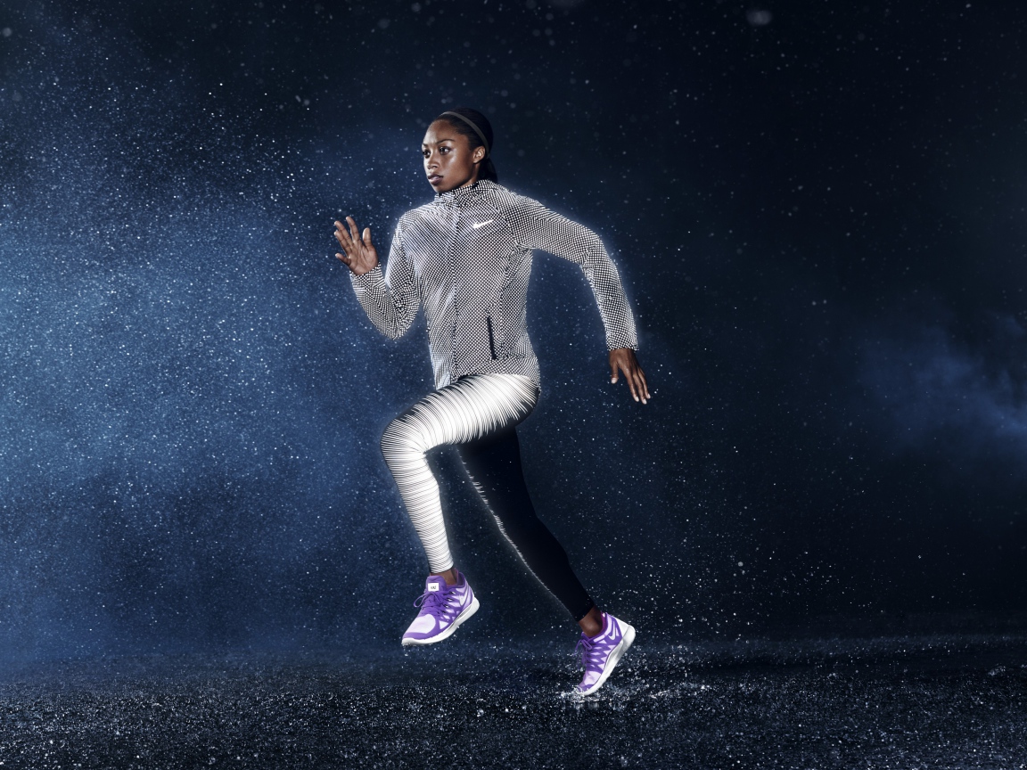 Олимпийская чемпионка бегунья  Эллиссон Феликс в форме Найк