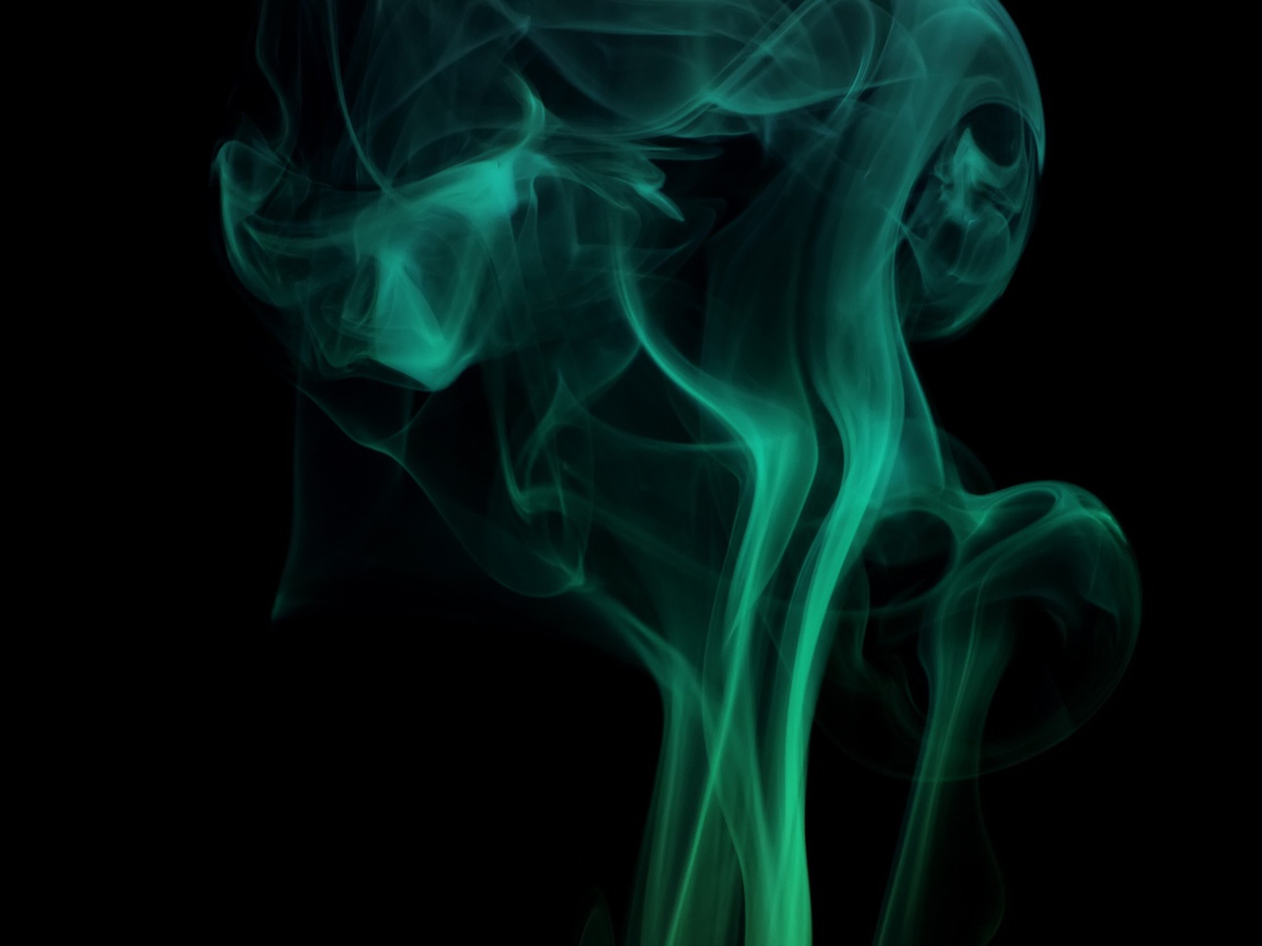 Зеленый дым на черном фоне