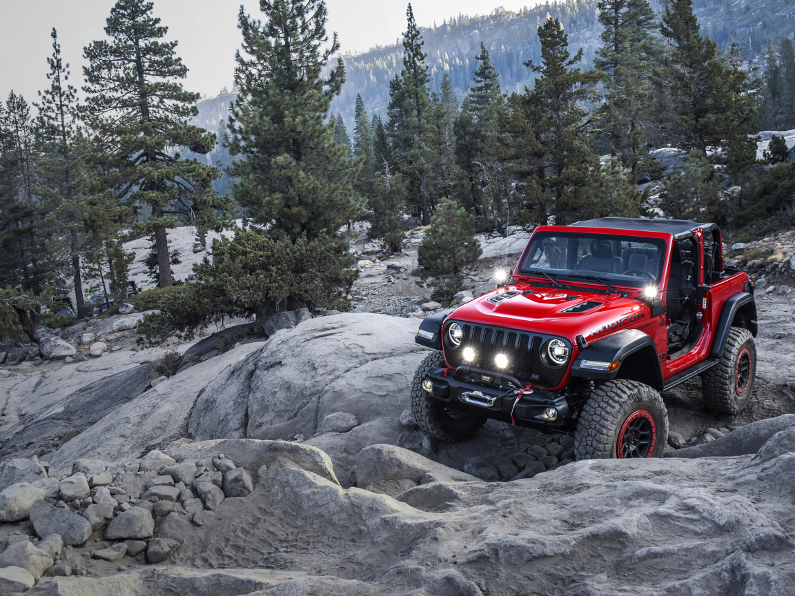 Red SUV Jeep Wrangler With Mopar, 2018 in the mountains