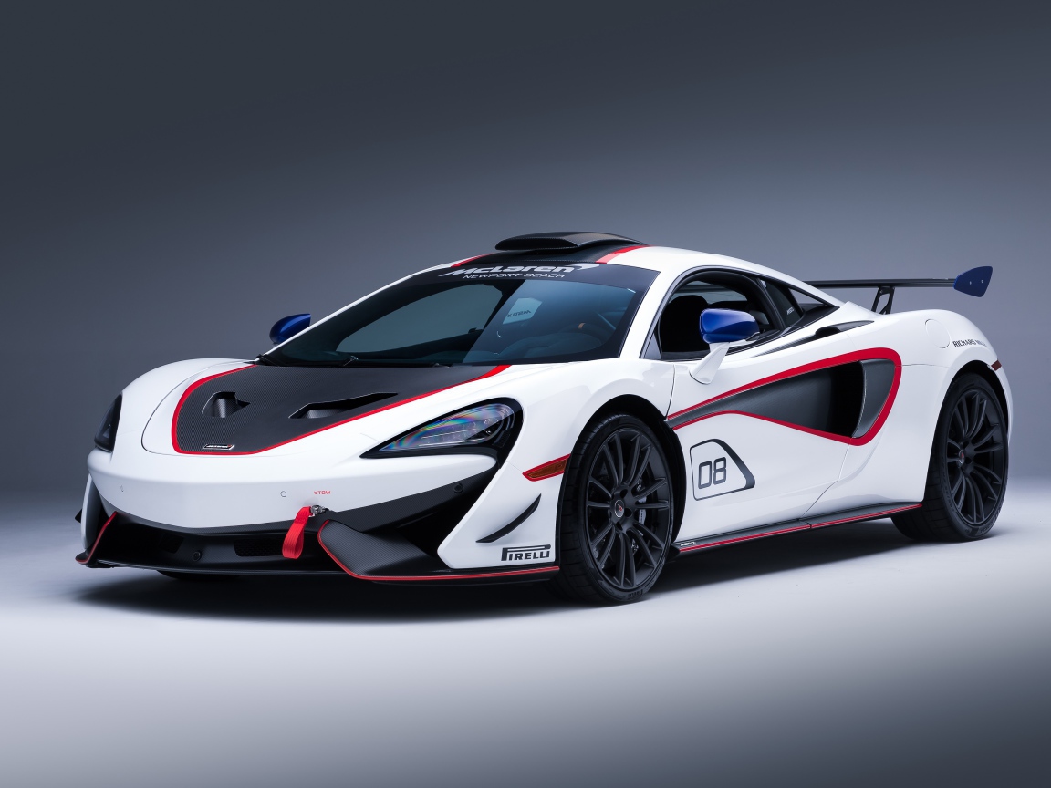 Спортивный автомобиль McLaren MSO X, 2018 на сером фоне