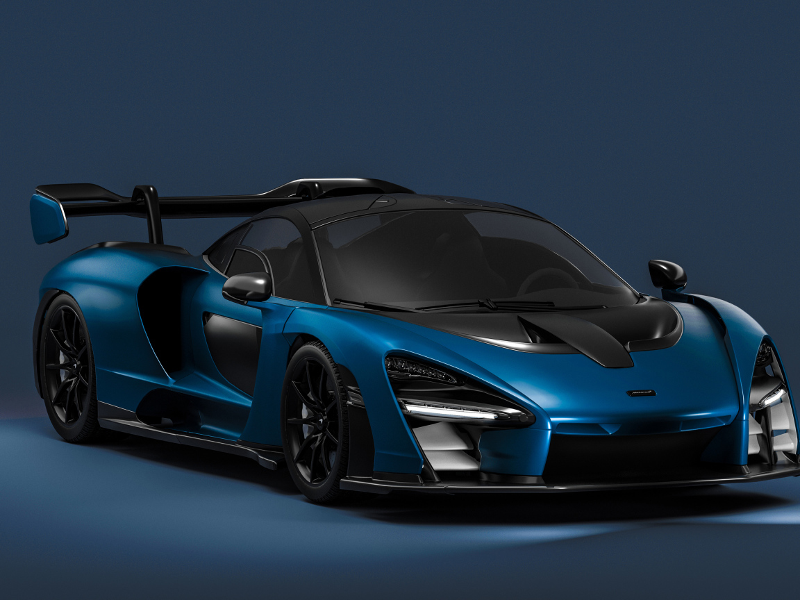 Синий спортивный автомобиль McLaren Senna CGI на сером фоне