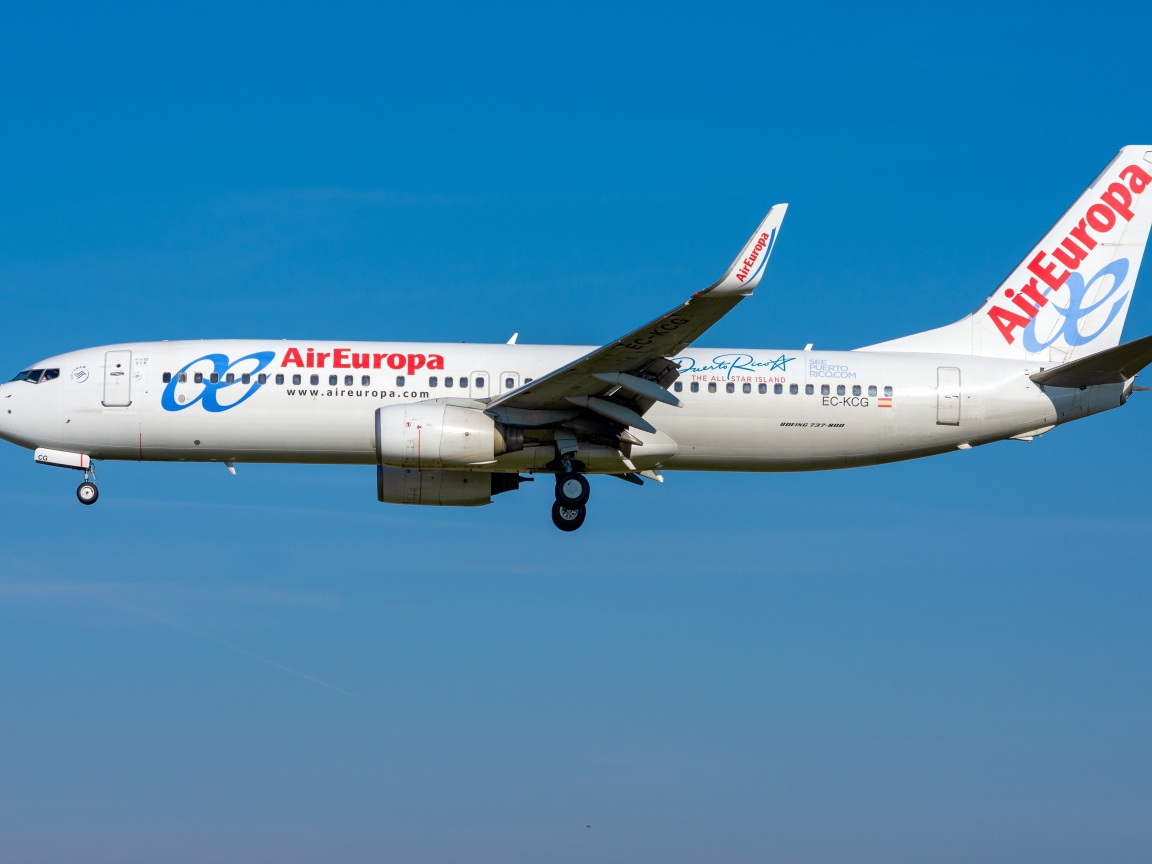 Large passenger Boeing 737-800W airline Air Europa in the blue sky