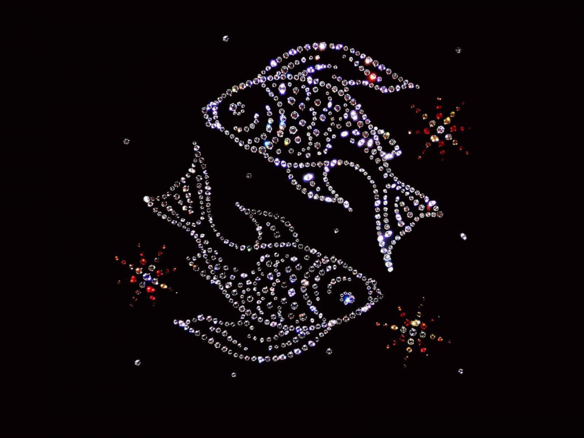 Блестящий знак зодиака рыбы на черном фоне