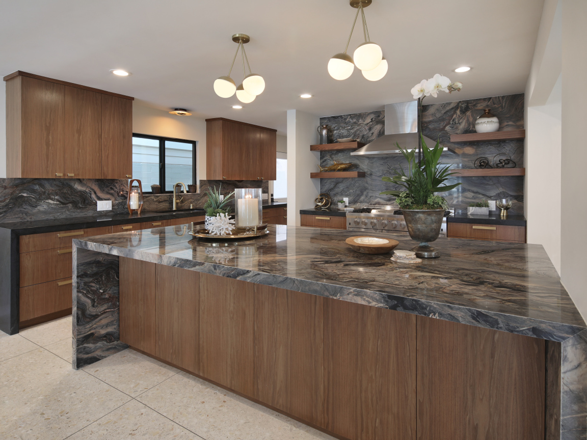 Beautiful brown kitchen with granite tables