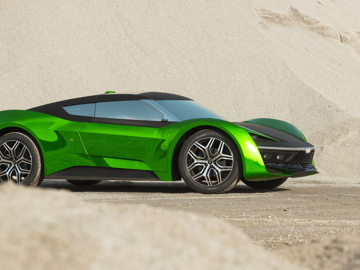 2020 green car GFG Vision stands in the sand