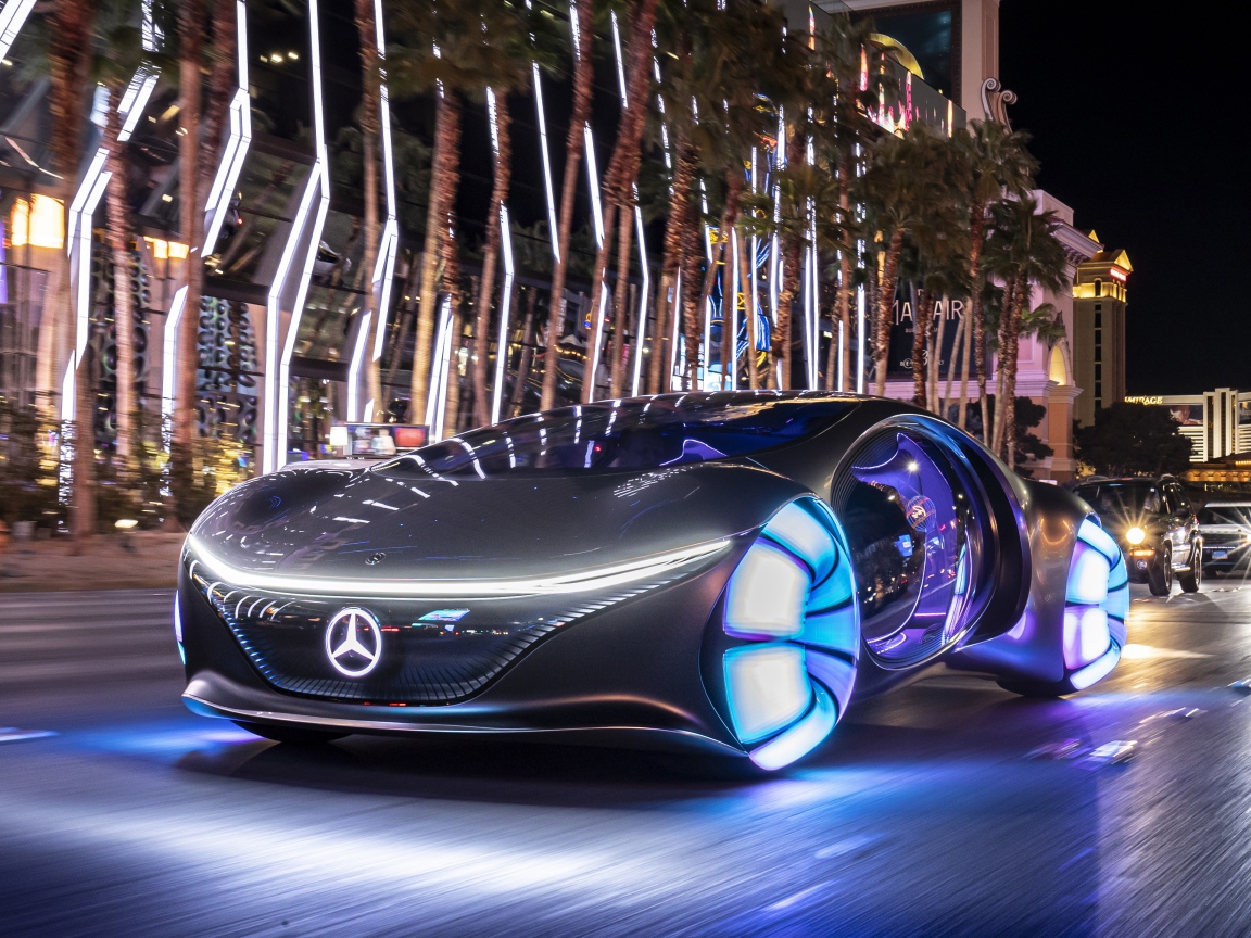 Автомобиль Mercedes-Benz VISION AVTR, 2020 года с неоновыми колесами на улице