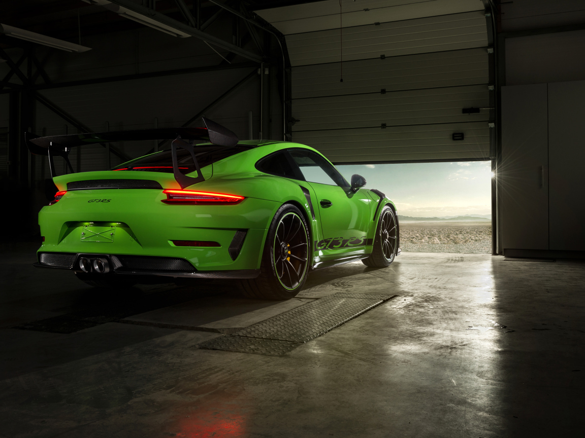Green Porsche GT3 RS car rear view