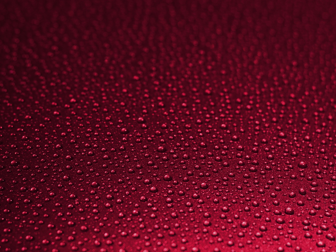 Красный фон с каплями воды 