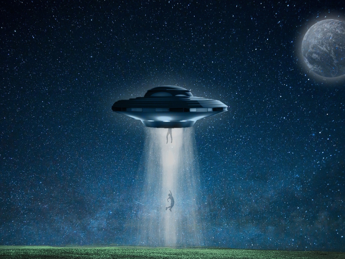 A flying saucer abducts a person at night over a field