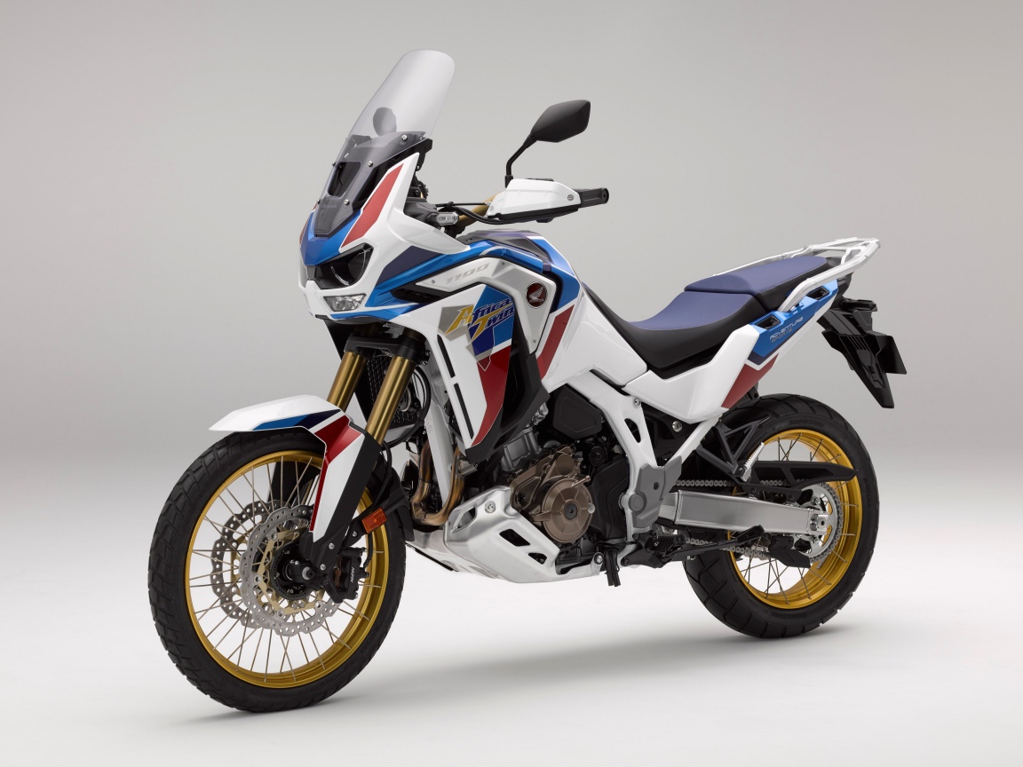 Спортивный мотоцикл Honda  CRF 1000 D, 2020  года на сером фоне