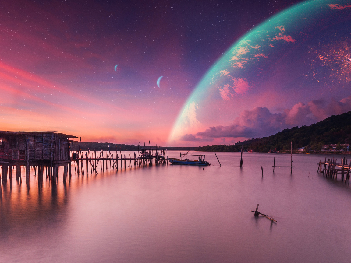 Big planet in the sky over a quiet lake