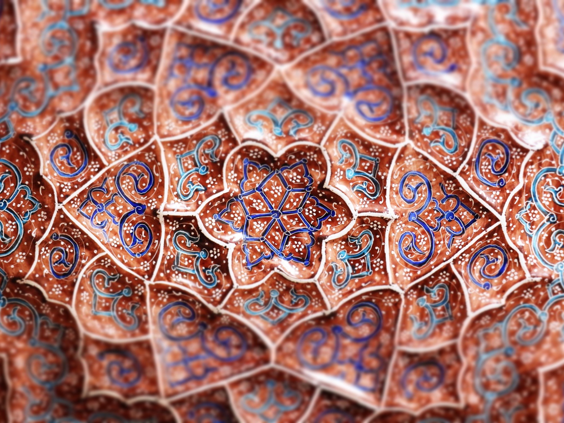 Beautiful blue patterns of flowers on brown background