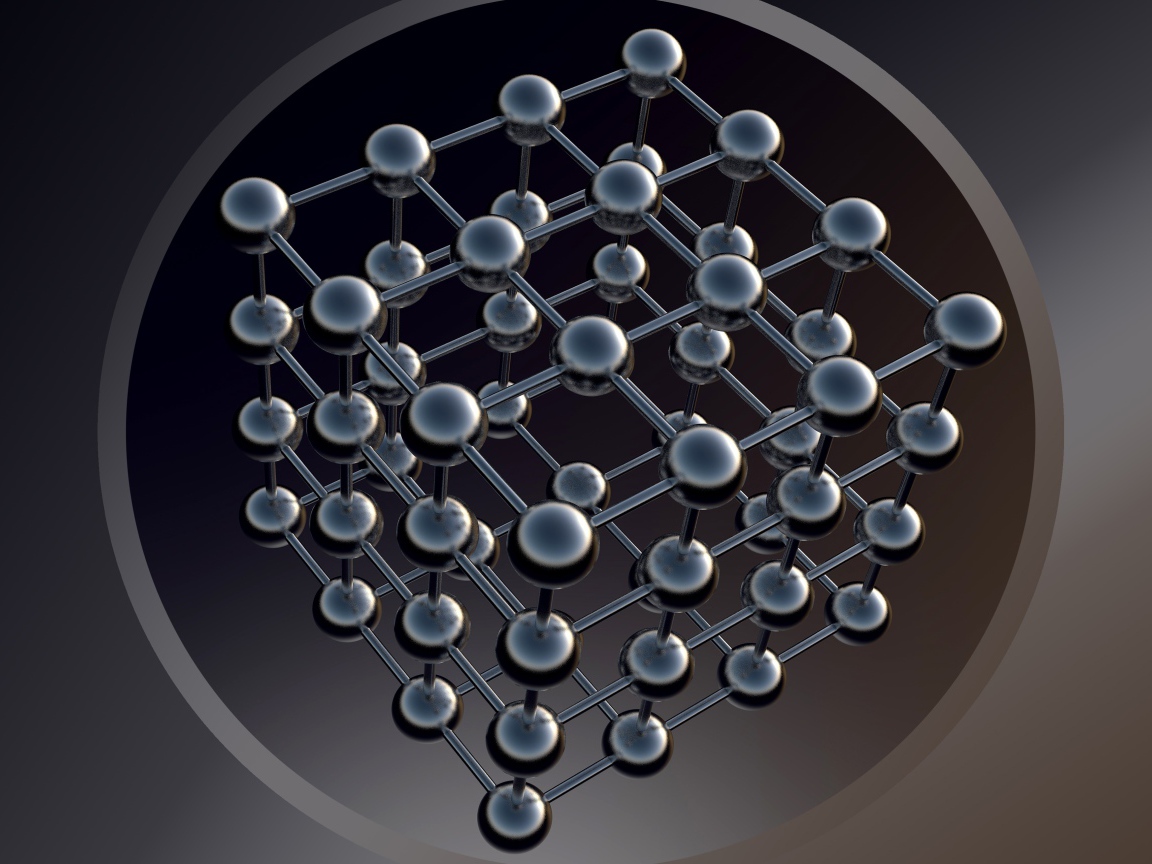 Шестигранник с черными шарами на сером фоне