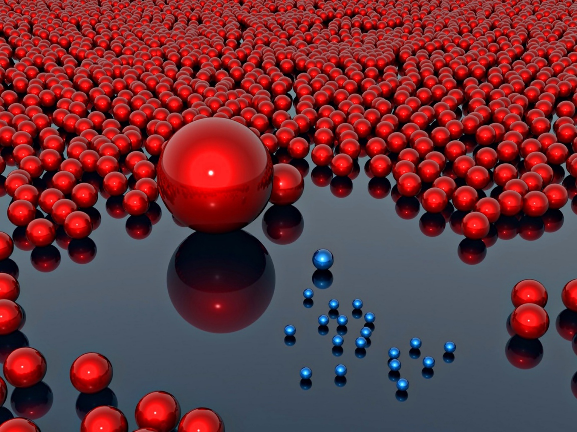 Много красных больших шаров и маленьких синих на сером фоне