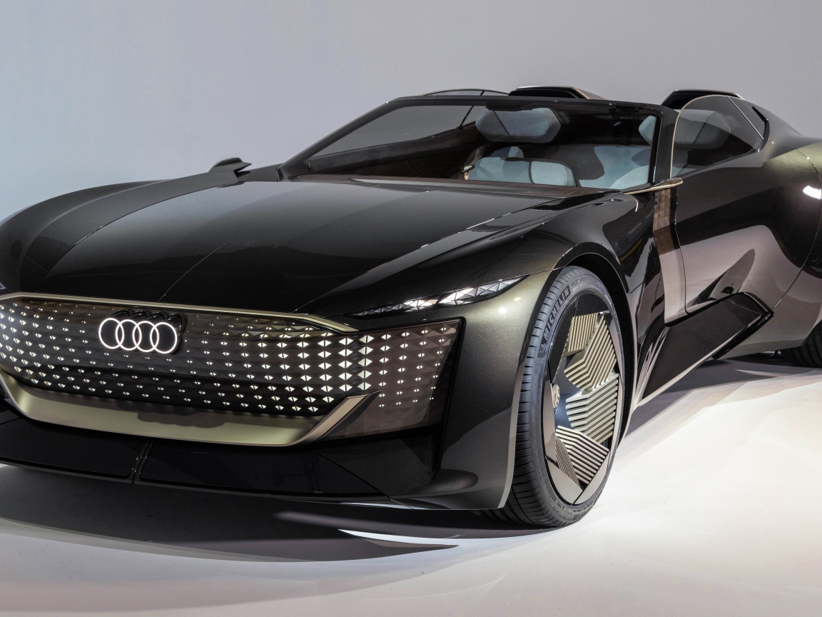 Черный автомобиль Audi Skysphere Concept 2021 года на сером фоне