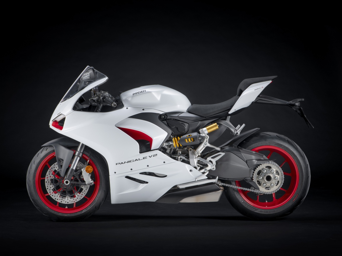 White motorcycle Ducati Panigale v2 on a black background