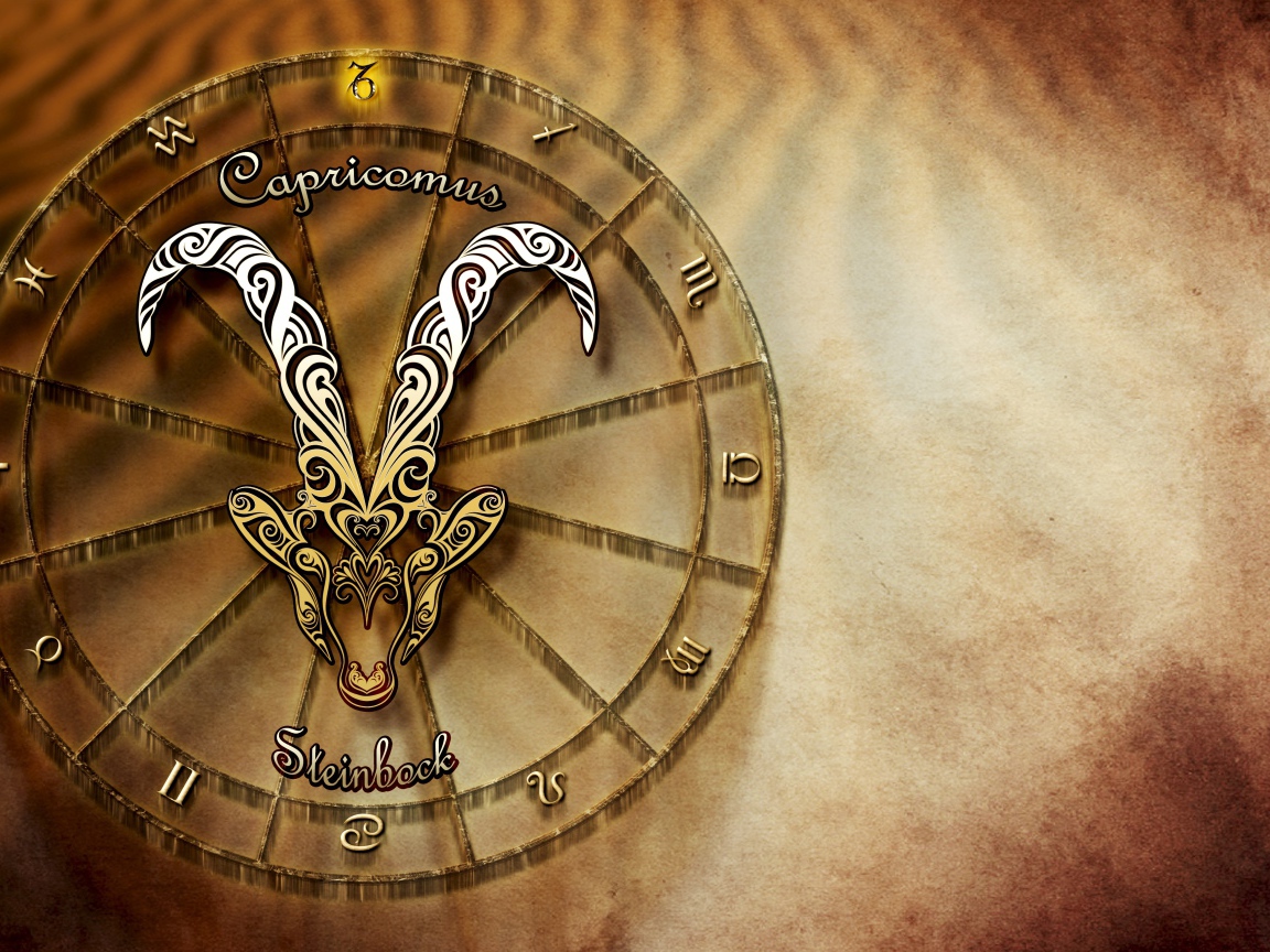 Зодиакальный знак козерог на оранжевом фоне